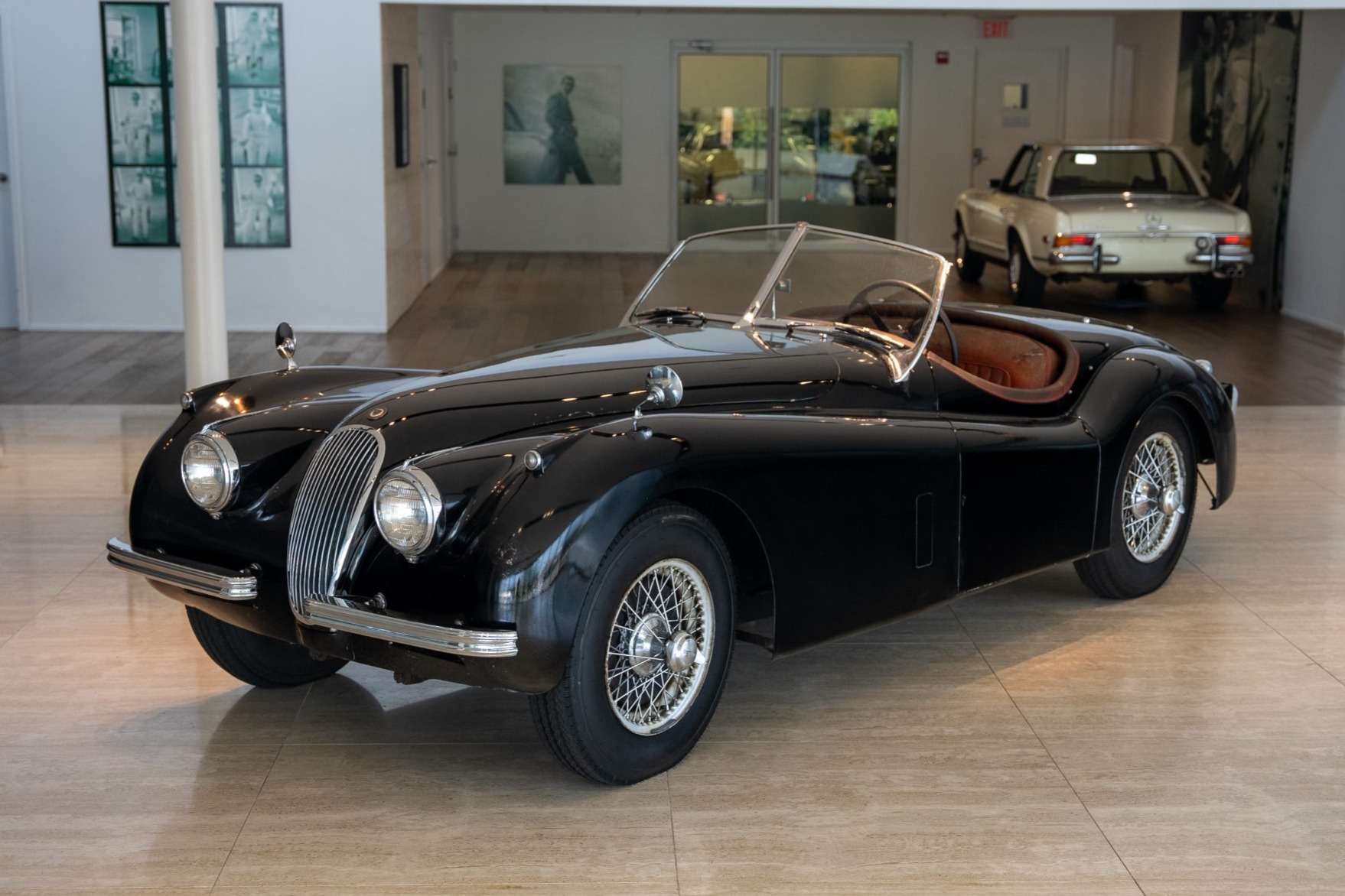 1954 Jaguar XK120 zu verkaufen – Schwarzer Roadster mit rotem Leder